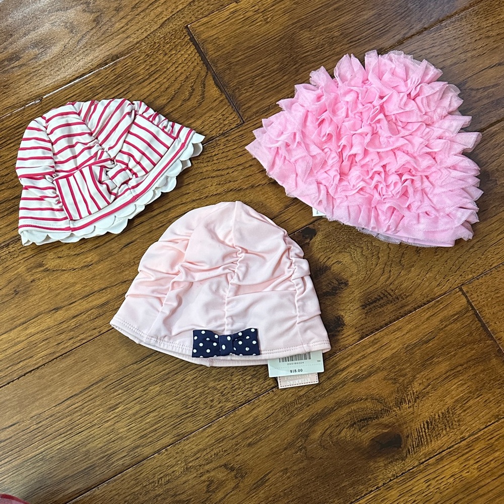Lot of 3  Swim caps in size 12/24